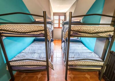 Habitación cuádruple en el albergue La casa de Gándara